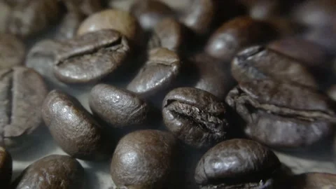 Coffee beans that have been fried and ready to be mashed to make coffee drinks Stock Footage 227101393