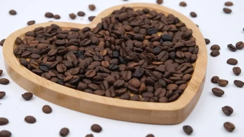 Coffee beans heart plate Stock Footage 240398856