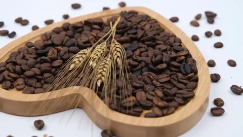Coffee beans heart plate Stock Footage 240399324
