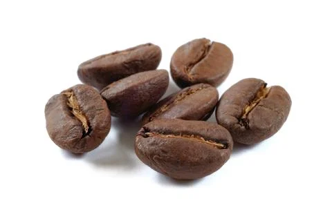 Coffee beans isolate close up on white background . Stock Photos