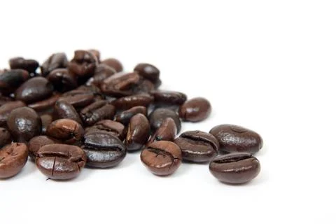 Coffee beans isolated from light Foto stock