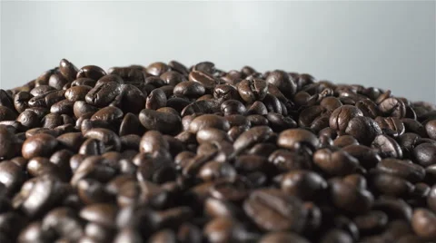 Coffee Beans isolated rotating on white background Stock Footage 62381595