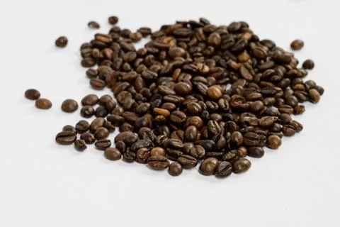 Coffee beans isolated on white background background with space for text. Roa Stock Photos