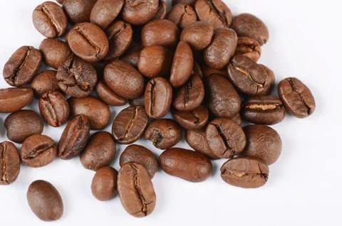 The coffee beans isolated on white Stock Photos