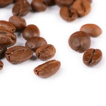 The coffee beans isolated on white Stock Photos
