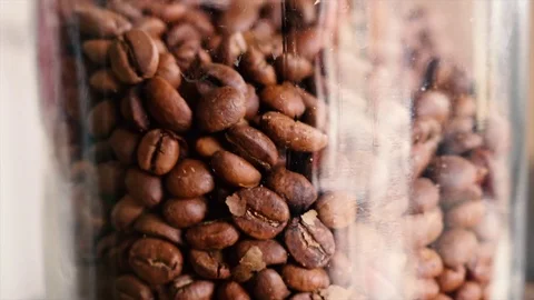 Coffee beans in a jar Stock Footage 98163668