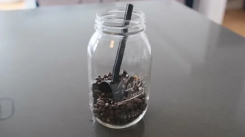 Coffee beans in jar Stock Footage 150231496