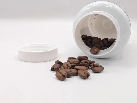 Coffee beans in a jar Stock Photos