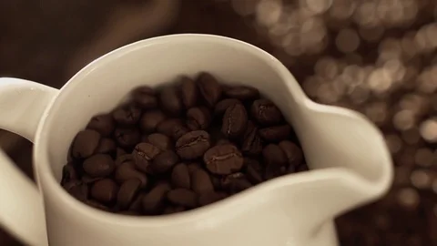 Coffee beans in jug Stock Footage 76050831