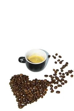 Coffee beans laid out in the shape of a heart on a white background. Isolate Stock Photos