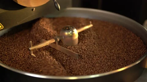 Coffee beans in large coffee roasting machine Stock Footage 234628832