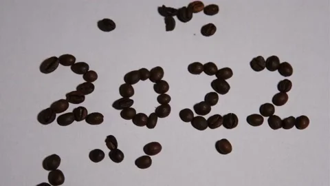 Coffee beans lie in the shape of the numbers 2022 Stock Footage 162774256