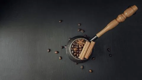 Coffee beans at the mixed heap of roasted coffee with copy space for text. .. 库存照片