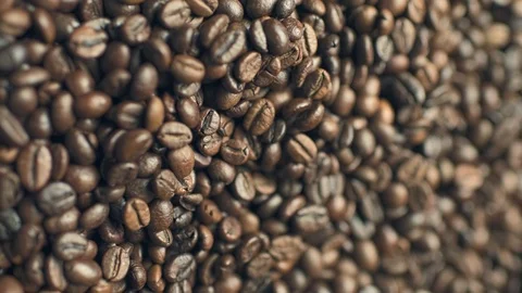 Coffee beans mixing by a spoon Stock Footage 125121994