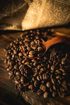 Coffee Beans with Newspaper Background Stock Photos