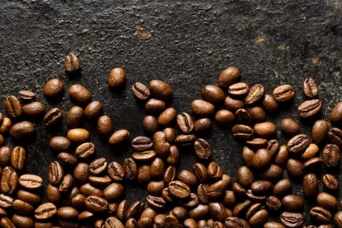 Coffee beans on old table Stock-Fotos