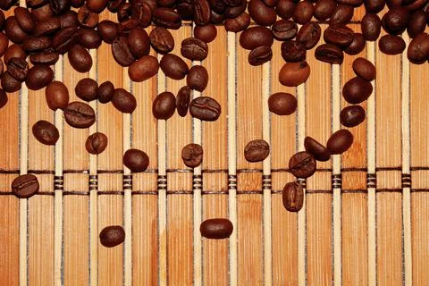 Coffee beans on one mat Stock Photos