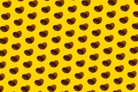 Coffee beans on an orange background. Stock Photos