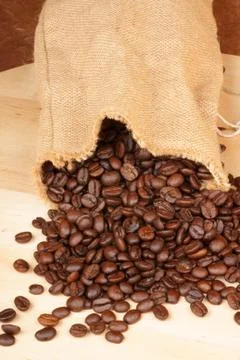 Coffee beans out of a hopsack Stock Photos