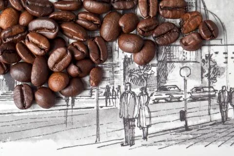 Coffee beans over a drawing Stock Photos