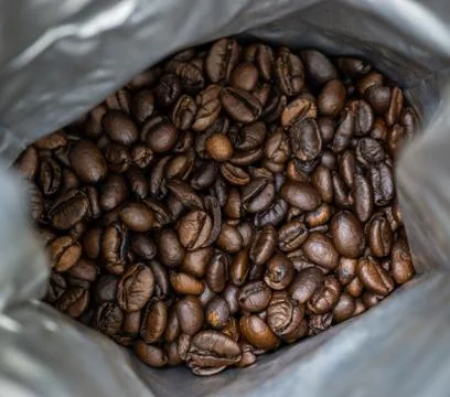 Coffee beans in a pack close-up. Stock Photos