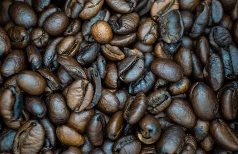 Coffee beans in a pack close-up. Stock Photos