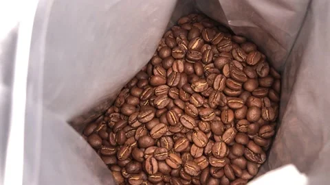 Coffee beans in a package Stock Footage 146824764
