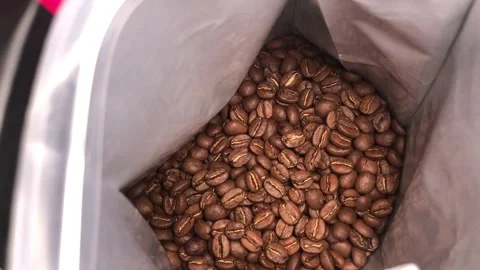 Coffee beans in a package Stock Footage 146824783