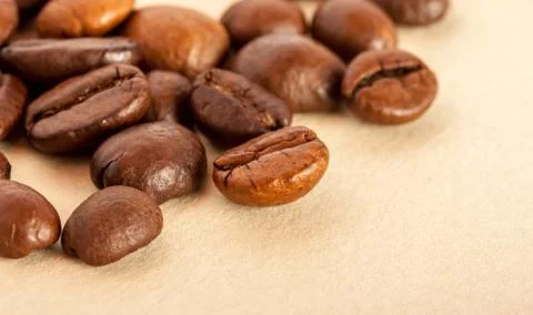 Coffee beans on the paper Stock Photos