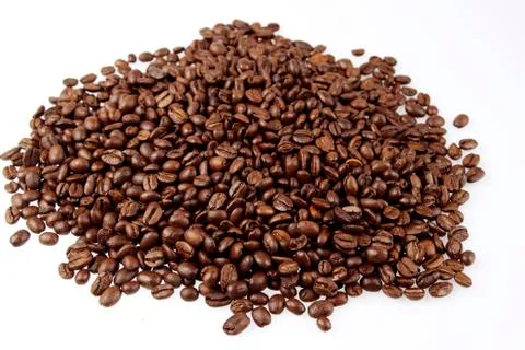 Coffee beans on plain background Stock Photos