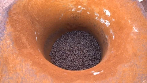 Coffee Beans Pounding In Mortar For Beverage Preparing Stock Footage 105399580