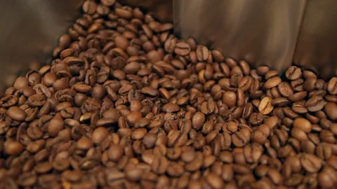 Coffee beans pour in, Dry, after roasting, roaster, side view Stock Footage 129400883