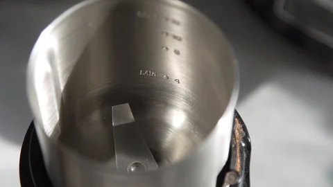 Coffee Beans Poured Into Coffee Grinder Stock Footage 124444397