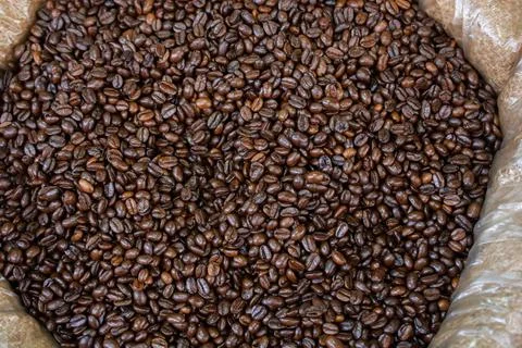 Coffee beans ready for the grinder background Stock Photos