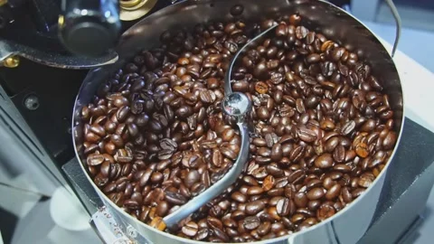 Coffee beans in roast machine. Fragrant coffee beans are roasted, hot aroma coff 스톡 동영상 272331224