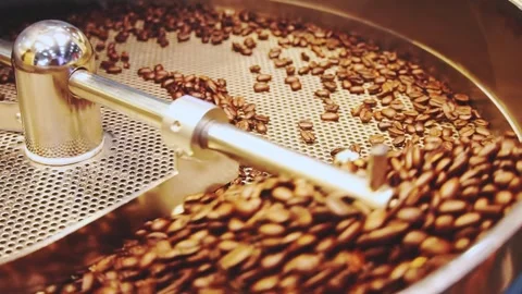Coffee beans in roast machine. Fragrant coffee beans are roasted, hot aroma coff Stock Footage 272331431