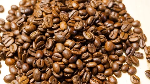 Coffee beans roasted. Close up of seeds of coffee. 4K Stock Footage 128591916