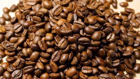 Coffee beans roasted. Close up of seeds of coffee. 4K 스톡 동영상 128592033