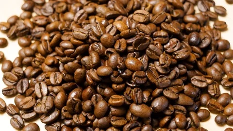 Coffee beans roasted. Close up of seeds of coffee. 4K 스톡 동영상 128592414