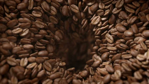 Coffee beans roasted in grinder falling into the interior of the machine Video stock 163410739