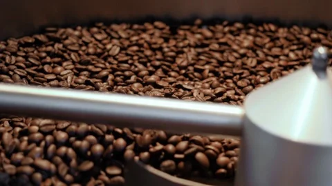 Coffee Beans In A Roaster. Close Up and Slow Motion. Видео 100900270
