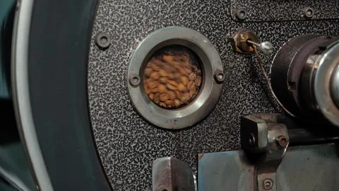 Coffee beans roasting process, industrial roaster close-up, Time Lapse Stock Footage 322544148