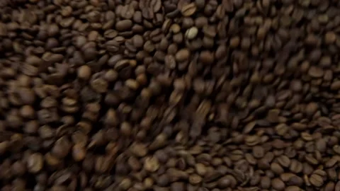 Coffee beans roasting process with roasting machine.	 Stock Footage 209530162