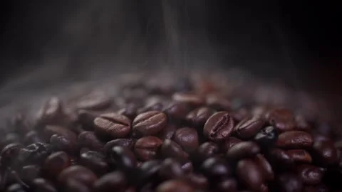 Coffee beans roasting with smoke,  selective focus, and soft focus. Stock Footage 241432308