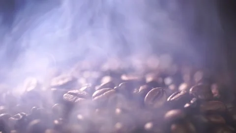 Coffee beans roasting with smoke,  selective focus, and soft focus. Stock Footage 241433040