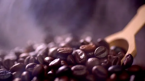 Coffee beans roasting with smoke,  selective focus, and soft focus. Stock Footage 241433231