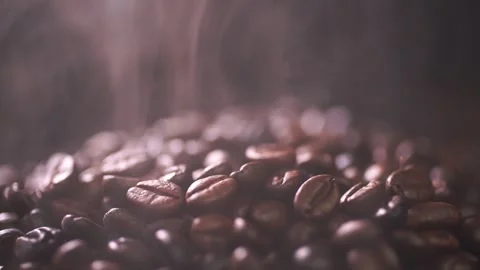 Coffee beans roasting with smoke,  selective focus, and soft focus. Stock Footage 241433406