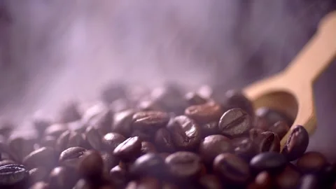 Coffee beans roasting with smoke,  selective focus, and soft focus. Stock Footage 241433791
