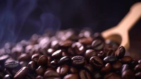 Coffee beans roasting with smoke,  selective focus, and soft focus. Stock Footage 241434117