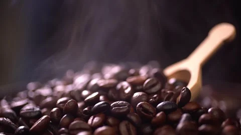 Coffee beans roasting with smoke,  selective focus, and soft focus. Stock Footage 241434401